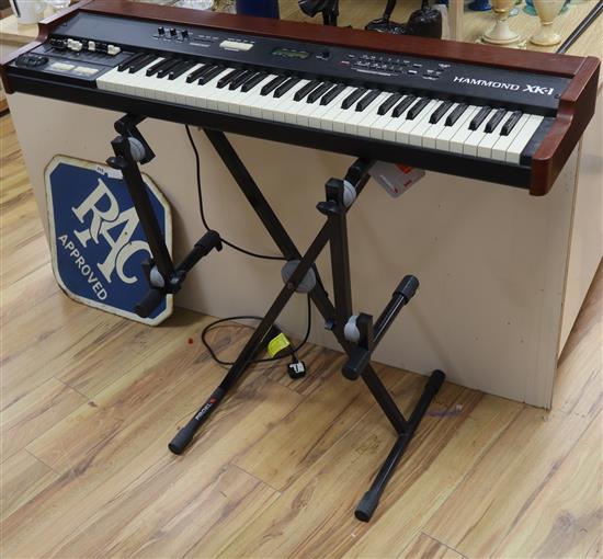 A Hammond organ model XK1 with stand